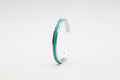 Bracelet réglable en acier inoxydable avec du cuir marin couleur turquoise roxane atelier