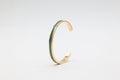 Bracelet réglable en acier inoxydable plaqué or avec du cuir marin couleur boréale roxane atelier